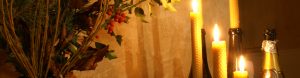 Beeswax candles and holly