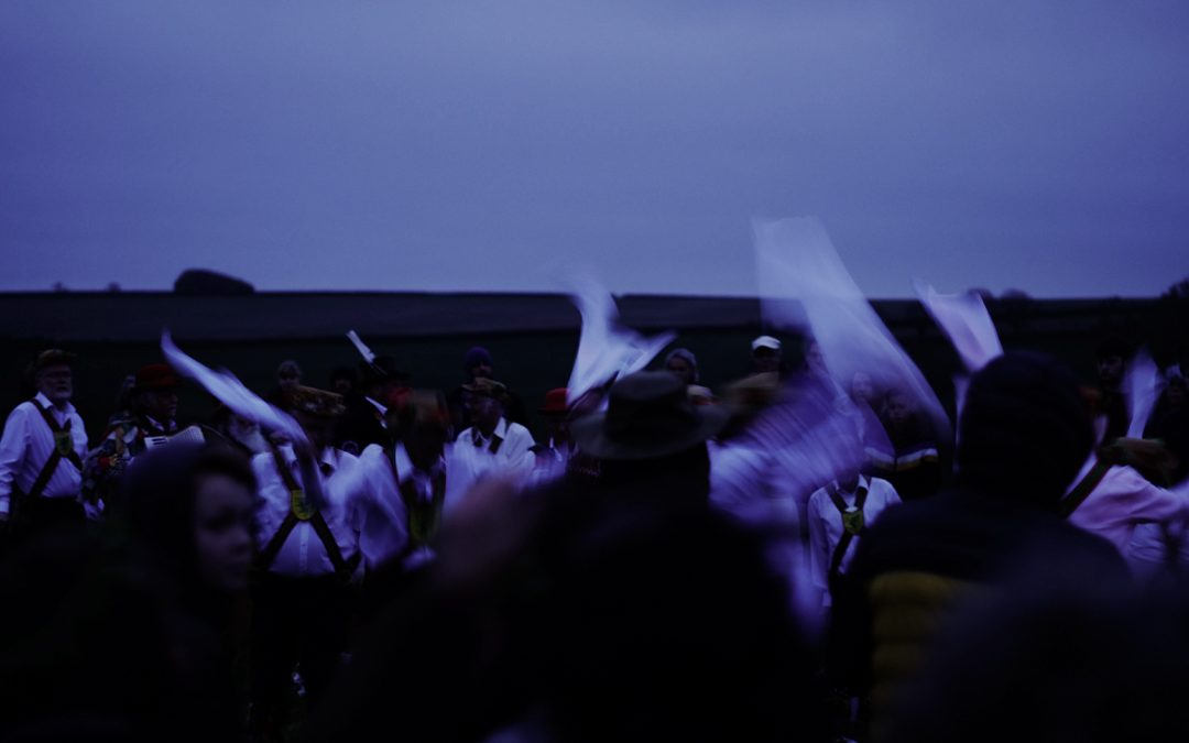 Morris dancers on the Cerne Giant celebrating Beltane